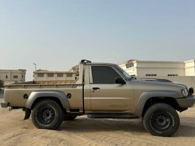 Nissan Patrol Y61 Pickup, with amazing body kit, 4inches lifted king shocks, two LCD screen with apple car play and cruise control