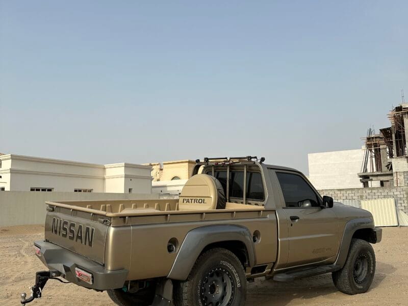 Nissan Patrol Y61 Pickup, with amazing body kit, 4inches lifted king shocks, two LCD screen with apple car play and cruise control