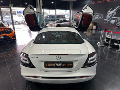 Mercedes-Benz SLR 2005 a high-performance grand tourer, a collaboration between Mercedes-Benz and McLaren, featuring a 5.4-liter supercharged V8 engine producing around 617 horsepower