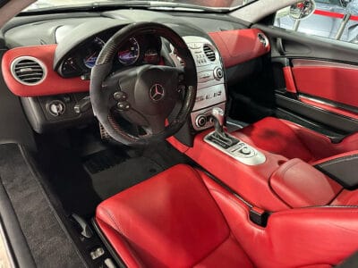 Mercedes-Benz SLR 2005 a high-performance grand tourer, a collaboration between Mercedes-Benz and McLaren, featuring a 5.4-liter supercharged V8 engine producing around 617 horsepower