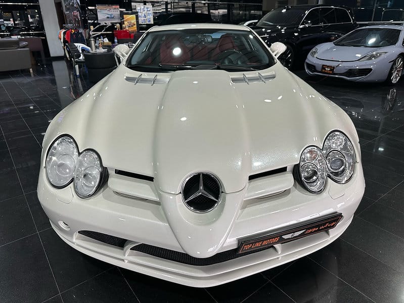 Mercedes-Benz SLR 2005 a high-performance grand tourer, a collaboration between Mercedes-Benz and McLaren, featuring a 5.4-liter supercharged V8 engine producing around 617 horsepower