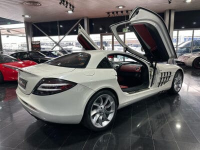 Mercedes-Benz SLR 2005 a high-performance grand tourer, a collaboration between Mercedes-Benz and McLaren, featuring a 5.4-liter supercharged V8 engine producing around 617 horsepower