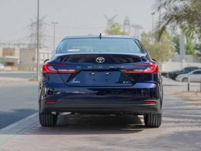 2025 Toyota Camry Lumiere 2.5L 4-Cylinder A/T Hybrid (Blue-Tan)