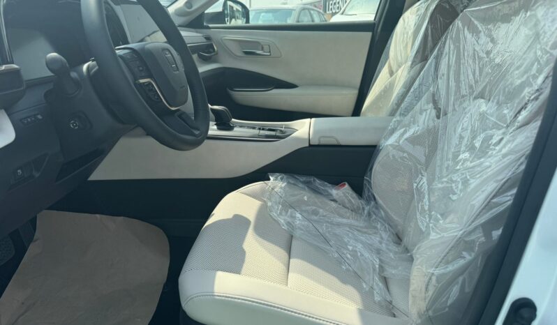 2023 Toyota Crown 2.4-litre turbocharged Hybrid inline-4 engine White Beige