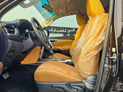 2025 Toyota Fortuner 2.7L V4 PETROL FULL OPTION GCC Specs Brown Tan