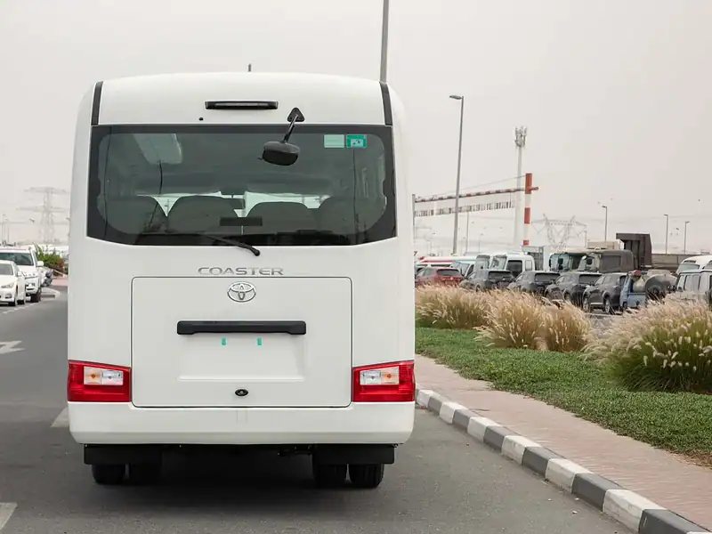 2025 Toyota Coaster HI ROOF 23S D 4.0L MT STD RD White Brown