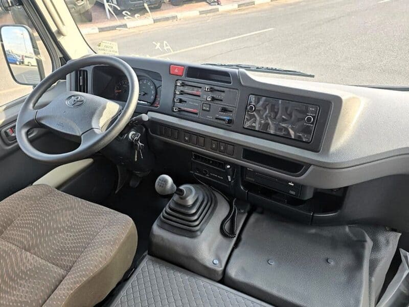 2026 Toyota Coaster VIP 4.2l diesel MT 22 Seats Electric Door White Brown