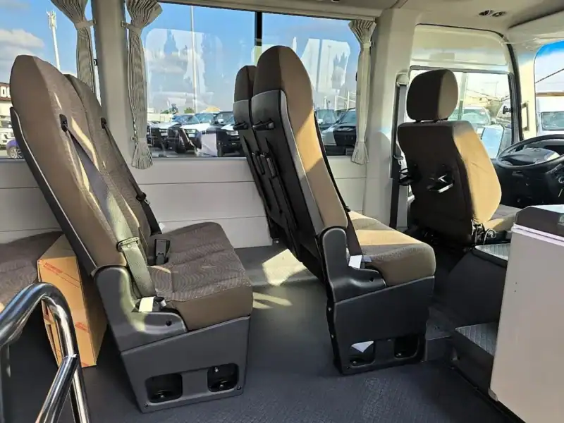 2026 Toyota Coaster VIP 4.2l diesel MT 22 Seats Electric Door White Brown