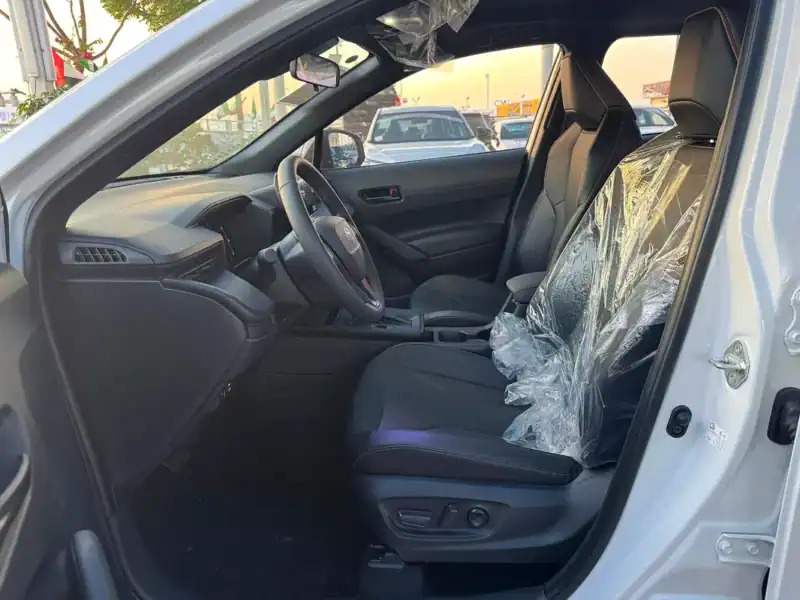 2025 Toyota Corolla Cross Hybrid 4 Cylinders Engine White Black Crossover