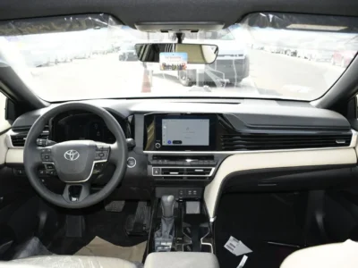 2025 Toyota Camry 2.5L 4 Cylinders Engine LE HEV White Beige Sedan FWD