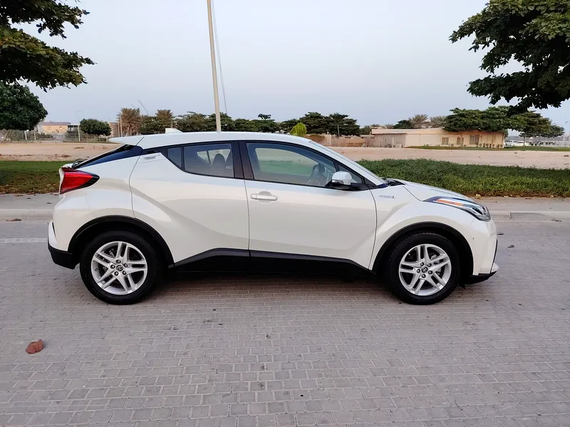2021 Toyota C-HR VX Hybrid 4 Cylinders Engine White Grey Hatchback GCC