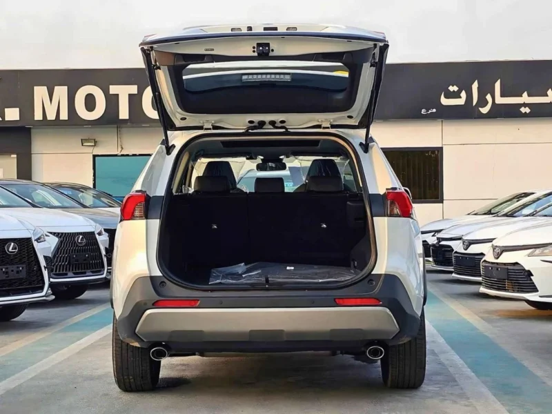 2025 Toyota RAV 4 HYBRID ELITE PLUS E-CVT 2.5L V4 4WD White Black SUV
