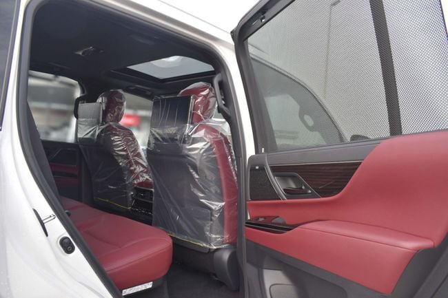 2025 Lexus LX 700h 3.5-liter twin-turbocharged V6 Hybrid Engine White Red SUV