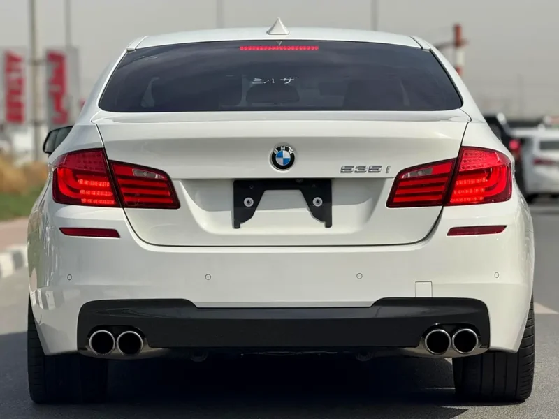 2012 BMW 5-Series 535i 3.0-liter twin-turbocharged inline-6 Engine White Black Sedan