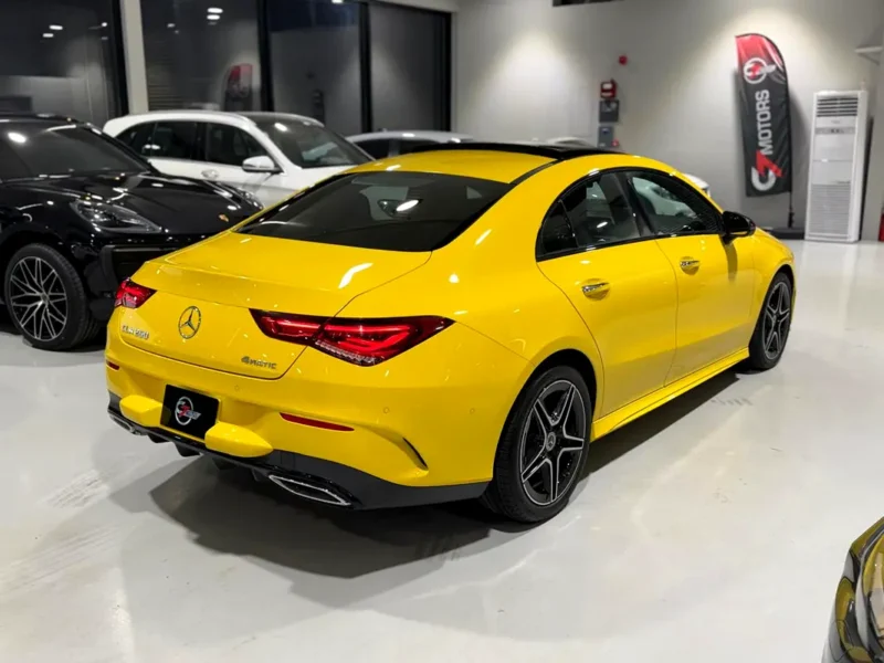 2023 Mercedes-Benz CLA-Class CLA250 4MATIC 2.0L inline-4 engine Yellow Black Sedan