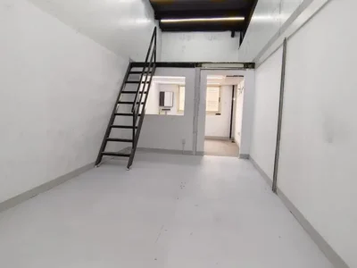 SPACIOUS MEZZANINE FLOOR UNIT WITH WINDOWS AND WASHBASIN WITH A WIDE ENTRY ACCESS