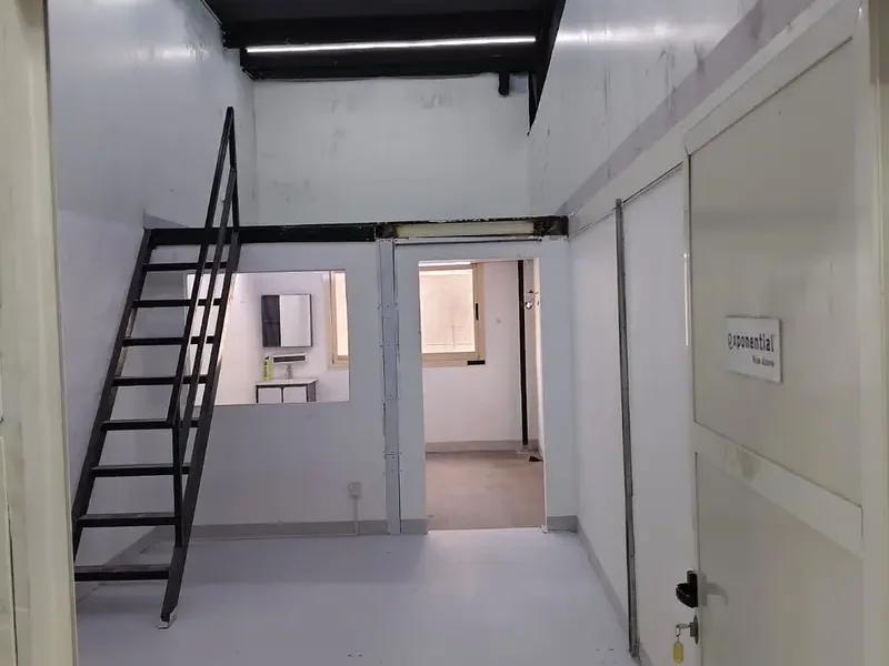SPACIOUS MEZZANINE FLOOR UNIT WITH WINDOWS AND WASHBASIN WITH A WIDE ENTRY ACCESS