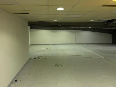 Expansive and Functional Warehouse Space Built for Practicality Offering Wide Entry Access